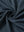 Jacquard quarter zip pullover, close-up fabric detail in black/blue showing textured knit pattern and soft feel