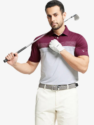 Half-body front shot holding golf club in GLACIER GREY Premium Performance Polo