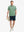 Full-body front view holding a takeaway drink cup, wearing GREEN SMALL LEAF Stylish Printing Summer Shirt.