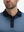Front shot from nose to chest of model wearing navy lines stylish full print contrast collared golf polo shirts