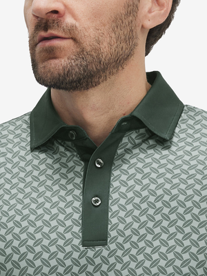 Front shot from nose to chest of model wearing dark green leaves stylish full print contrast collared golf polo shirts