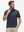 Front upper body shot of model wearing navy graffiti stylish full print contrast collared golf polo shirts