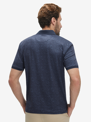 Back upper body shot of model wearing navy graffiti stylish full print contrast collared golf polo shirts