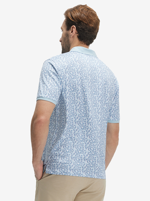 Back upper body shot of model wearing lines geometric stylish full print contrast collared golf polo shirts