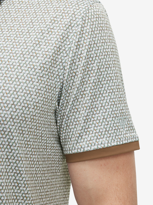 Detail view of cuff on hexagon grid stylish full print contrast collared golf polo shirts