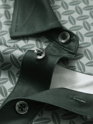 Detail view of collar on dark green leaves stylish full print contrast collared golf polo shirts