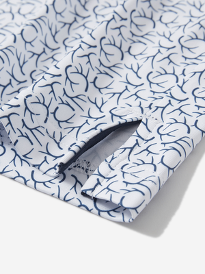 Detail view of hem on navy antlers stylish full print contrast collared golf polo shirts