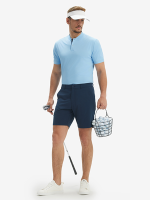 Full-body front: model in light blue moisture-wicking short sleeve henley shirt holding a golf club.