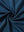 Jacquard quarter zip pullover, close-up fabric detail in navy/blue showing textured knit pattern and soft feel